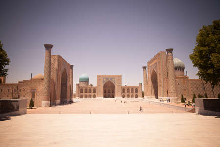 Samarkand, Uzbekistan - June 7, 2017: People walk in front of the Registan palace in Samarkand, Uzbekistan.のeditorial素材