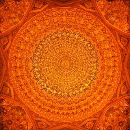 Close up shot of some Arabic decorations on a ceiling.の写真素材