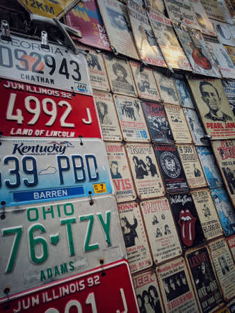London, England - January 13, 2018: Color vintage tin adverts on a window shop in London, England.のeditorial素材