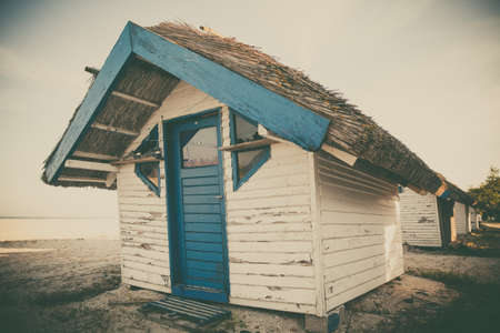 Blue and white painted hut in a sea resort.
