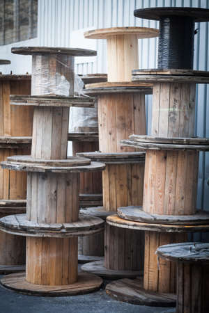 Close up shot of some big empty cable reels.の写真素材