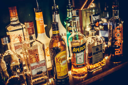Bucharest Romania - July 29, 2018: Various bottles of alcohol are displayed in bar in Bucharest, Romania.のeditorial素材