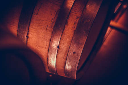Close up shot of some wine barrels in a cellar.の写真素材