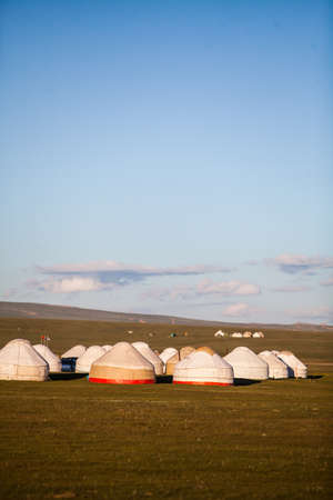 Shot of some yurts on a meadow in Kyrgyzstan.