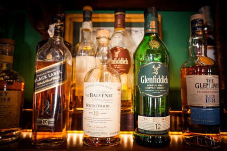 Bucharest Romania - May 8, 2018: Various bottles of alcohol are displayed in bar in Bucharest, Romania.のeditorial素材