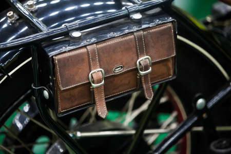 Close up shot of a vintage motorcycle leather saddle bag.
