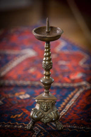Color image of a single vintage candlestick.の写真素材