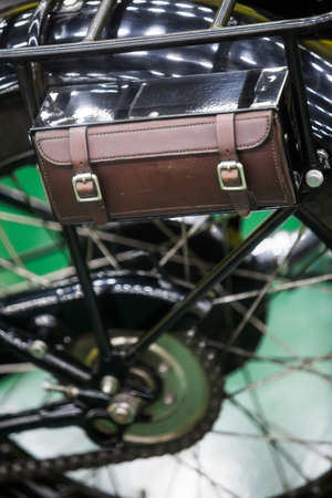 Close up shot of a vintage motorcycle leather saddle bag.