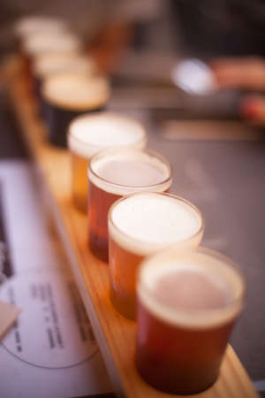 Selection of beers on a tasting mat.