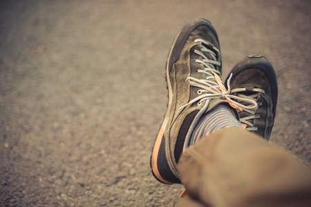 Above shot some worn shoes with shoe laces.の写真素材