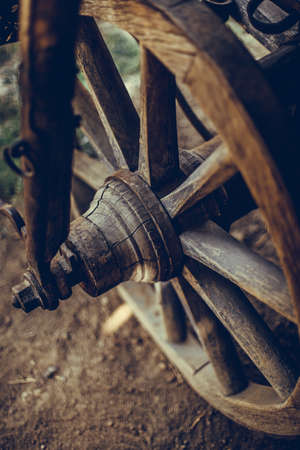 Color image of a old wooden cart wheel.の写真素材