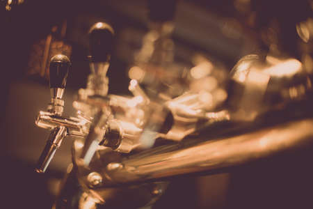 Close up of a beer dispenser in a pub.