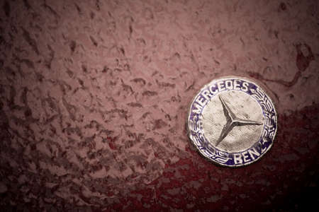 Bucharest, Romania - January 27, 2019: Illustrative-editorial image of a Mercedes Benz logo is displayed on a car's hood, covered by ice. Mercedes Benz is a German car manufacturer.のeditorial素材