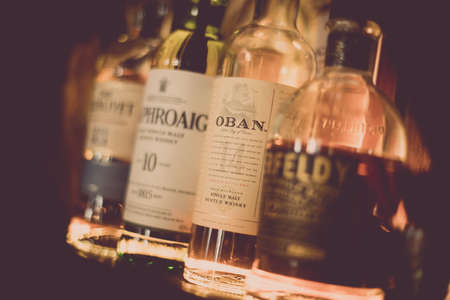 Bucharest Romania - February 19, 2019: Various bottles of alcohol are displayed in bar in Bucharest, Romania.のeditorial素材