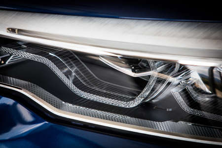 Close up shot of some LED automobile headlights.