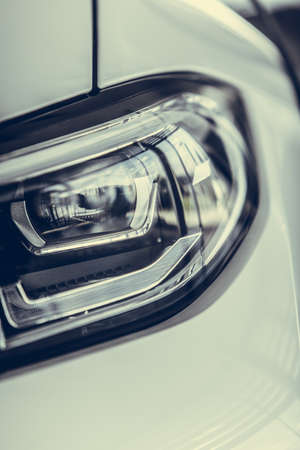 Close up shot of some LED automobile headlights.