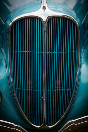 Close up shot of the radiator grille of a vintage car.の写真素材