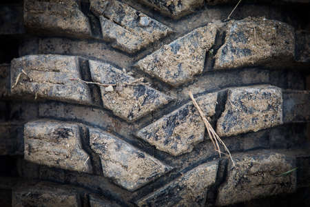 Close up shot of a muddy off road tire on a 4x4 car.の写真素材