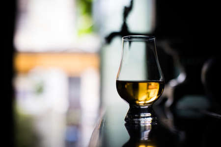 Close up shot of a Glencairn whisky glass.