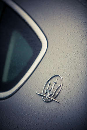 Mandello del Lario, Italy - May 25, 1019: Illustrative editorial close up shot of the Maserati logo on a car. Maserati is an Italian luxury vehicle manufacturer.のeditorial素材