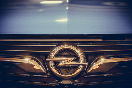 Bucharest, Romania - October 23, 2019: Illustrative editorial close up shot of the Opel logo on a car. Opel is a German automobile manufacturer.のeditorial素材