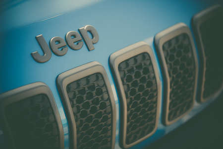 Bucharest, Romania - October 23, 2019: Illustrative editorial close up shot of the Jeep logo on a car. Jeep is a brand of American automobile.のeditorial素材