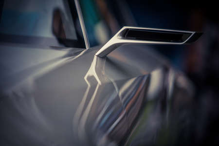 Close up shot of a sport car's side mirror.