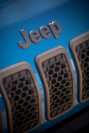 Bucharest, Romania - October 23, 2019: Illustrative editorial close up shot of the Jeep logo on a...