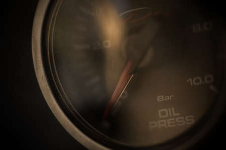 Close up shot of a car's oil pressure gauge.の写真素材