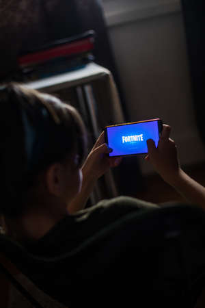 Bucarest, Romania - May 26. 20202: Image of some Lime-s e-scooters parked on sidewalk in Bucharest, Romania.のeditorial素材