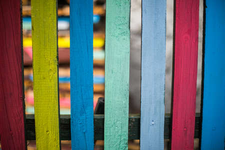 Close up shot of some wood planks painted in various colors, background concept.の写真素材