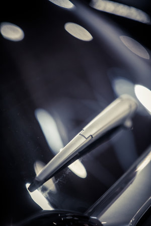 Close up shot of a modern new screen wiper on a car's windshield.の写真素材