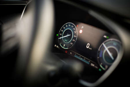 Close up shot of a digital dashboard of a new car, showing the speedometer.の写真素材