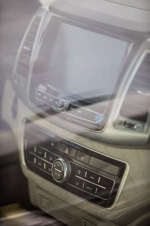 Close-up shot of a car's multimedia and navigation display on the dashboard.