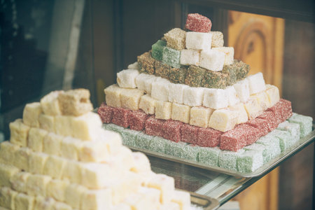 A pile of rahat lukum or Turkish delight, oriental sweets in a store.の写真素材