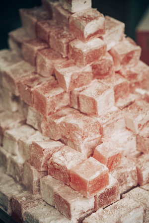 A pile of rahat lukum or Turkish delight, oriental sweets in a store.の写真素材