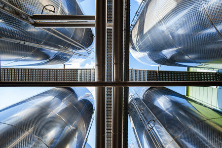Close up shot of many alloy inox pipes in a factory.の写真素材