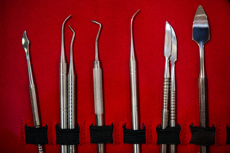 Close up shot of a collection of dental medical equipment tools.