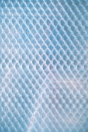 Metal background with circular radial polish surface.