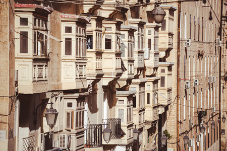 Traditional colorful enclosed wooden balconies, called gallarij in the Island of Malta.の写真素材