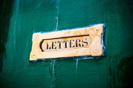 Close up shot of a front door postal box mail slot.の写真素材