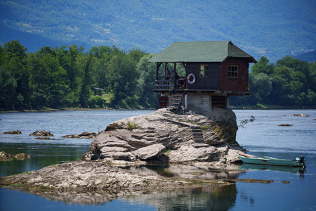 A small house in the middle of the river Drinaの写真素材