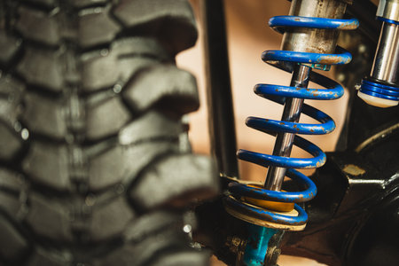 Close up shot of the used suspension of an offroad car.の写真素材