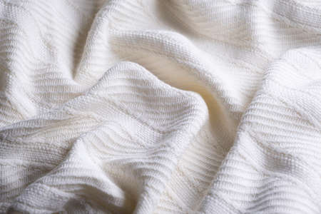 soft white embossed striped fabric or plaid close-up fabric structure backgroundの写真素材