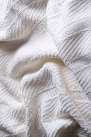 soft white embossed striped fabric or plaid close-up fabric structure vertical background