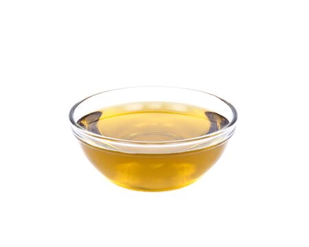 Extra virgin oil in bowl separated on white backgroundの写真素材