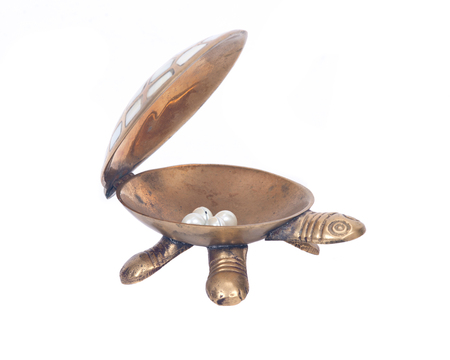 Decorative turtle jewelry box separated on white backgroundの写真素材