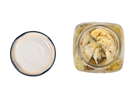 Food of love, marinated artichokes in jar isolated on white backgroundの写真素材