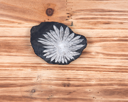 The white flower  Chrysanthemum stone on vintage wooden backgroundの写真素材
