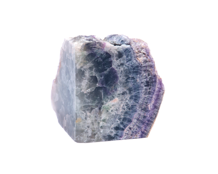 Partially polished rainbow fluorite with a naturally rough edge, isolated on white backgroundの写真素材